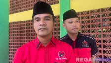 Caption: Bupati Bangkalan Lukman Hakim, diwawancara awak media disela konfercab PDI-P Bangkalan, (dok. regamedianews). 
