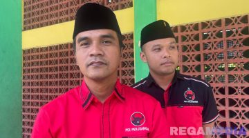 Caption: Bupati Bangkalan Lukman Hakim, diwawancara awak media disela konfercab PDI-P Bangkalan, (dok. regamedianews). 