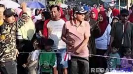 Caption: Kepala Desa Nyalabu Daya membuka langsung acara Jalan-Jalan Sehat, (dok. regamedianews). 