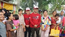 Caption: Bupati Lukman Hakim dan Wabup Fauzan Ja'far, pose bersama warga Bangkalan disela berlangsungnya event BOR X, (dok. regamedianews). 
