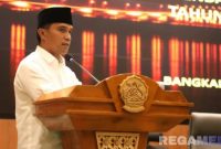 Caption: Bupati Bangkalan Lukman Hakim, sampaikan sambutan saat rapat paripurna di Gedung DPRD Bangkalan, (foto istimewa). 