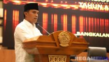 Caption: Bupati Bangkalan Lukman Hakim, sampaikan sambutan saat rapat paripurna di Gedung DPRD Bangkalan, (foto istimewa). 