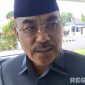 Caption: Wakil Ketua DPRD Bangkalan, H. Fatkhurrahman, saat diwawancara awak media, (dok. regamedianews). 