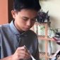 Caption: Yusuf Abdurrahman, santri asal Sampang yang selamat dari ambruknya bangunan mushola Ponpes Al-Khoziny Buduran, (dok. regamedianews). 
