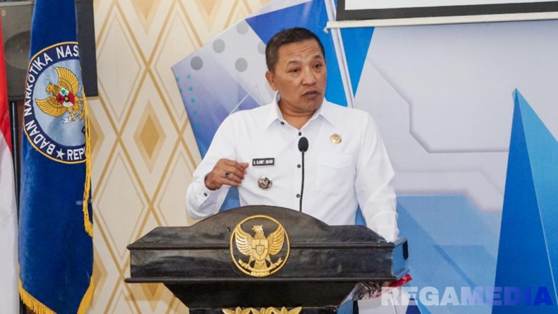 Caption: Bupati Sampang H Slamet Junaidi, sampaikan sambutan saat pembukaan kegiatan informasi dan edukasi advokasi P4GN, (sumber foto: Diskominfo Sampang). 