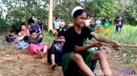 Caption: semangat peserta lomba tarik tambang yang digelar Pemerintah Desa Rabasan, (dok. regamedianews). 
