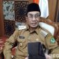 Caption: Bupati Pamekasan KH Kholilurrahman, saat diwawancara awak media di Pendopo Ronggosukowati, (dok. regamedianews). 