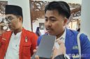 Caption: Homaidi aktivis Pergerakan Mahasiswa Islam Indonesia (PMII), saat diwawancara awak media, (dok. regamedianews). 