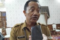 Caption: Kepala Dinas Keuangan Kabupaten Pamekasan, Sahrul Munir, (dok. regamedianews). 