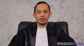 Caption: Pendamping Hukum Kepala Dinas PMD Gorontalo Utara, Rivki Mohi, (dok. regamedianews). 