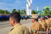 Caption: berlangsungnya apel trantibum dan kesiapsiagaan bencana hidrometeorologi, di Monumen Arek Lancor Pamekasan, (dok. regamedianews). 