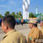 Caption: berlangsungnya apel trantibum dan kesiapsiagaan bencana hidrometeorologi, di Monumen Arek Lancor Pamekasan, (dok. regamedianews). 