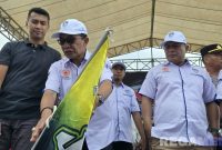 Caption: Bupati Pamekasan Kholilurrahman membuka Kejurprov Jatim road race 2025, (dok. regamedianews). 