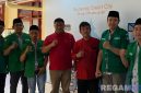 Caption: Satgas BAANAR PC GP Ansor Sumenep pose bersama pihak Diskominfo Sumenep, (dok. foto istimewa). 
