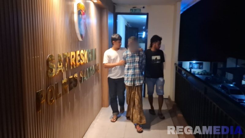 Caption: anggota Satreskrim Polres Sampang hendak amankan pelaku pembunuhan di Desa Noreh, (sumber foto: Humas Polres Sampang). 