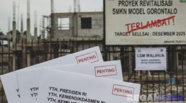 Caption: gambar ilustrasi LSM Walihua surati Pemerintah Pusat ihwal mangkraknya proyek revitalisasi SMKN Model Gorontalo, (dok. Gemini AI). 