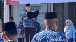 Caption: Kalapas Narkotika Pamekasan Kusnan, bacakan amanatnya saat pimpin upacara peringatan Hari Ibu ke-97, (dok. foto istimewa). 