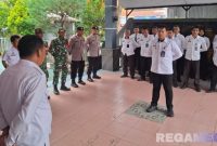 Caption: Petugas Rutan Kelas IIB Sampang saat gelar apel siaga pengamanan Nataru 2026 bersama TNI dan Polri, (dok. foto istimewa). 