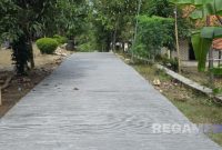 Caption: Salah satu jalan cor didusun Ombaran (dok.regamedianews)