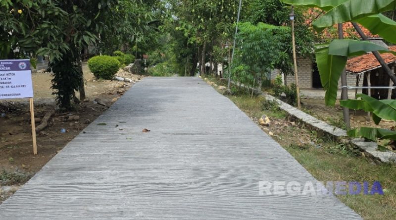 Caption: Salah satu jalan cor didusun Ombaran (dok.regamedianews)
