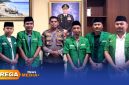 Caption: Wakapolres Sumenep Kompol Masyhur Ade, pose bersama anggota LBH PC GP Ansor Sumenep, (sumber foto: Sumenep.go.id). 