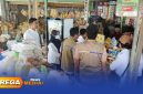 Caption: Perum Bulog Cabang Madura dan Dinas Perdagangan Sumenep, sosialisasi dan pengawasan langsung ke pasar, (dok. Kurdi Rega Media). 